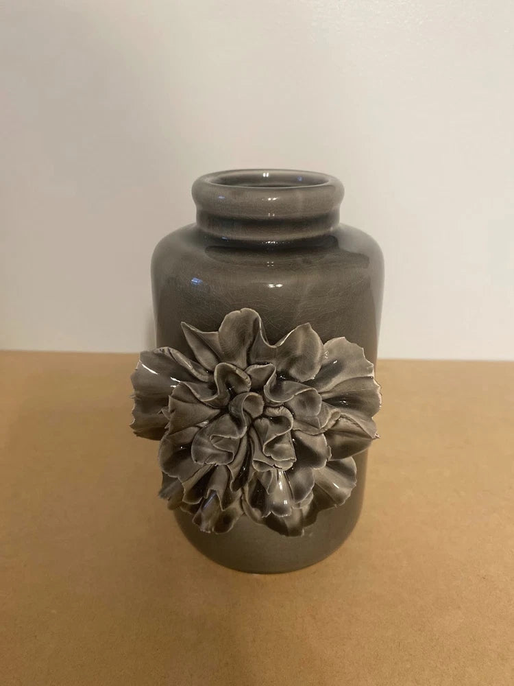 Grey ceramic vase with raised carnation flower and crackle glaze