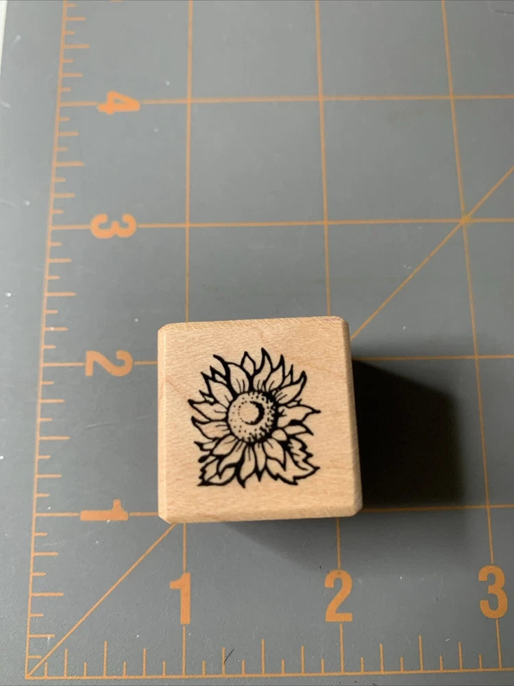 Sunflower rubber stamp on light wood block, black sunflower design