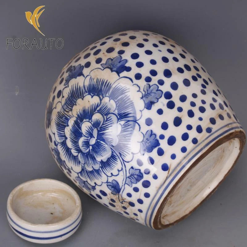 Blue-and-white porcelain peony tea-leaves pot, rounded with blue dots and floral motif