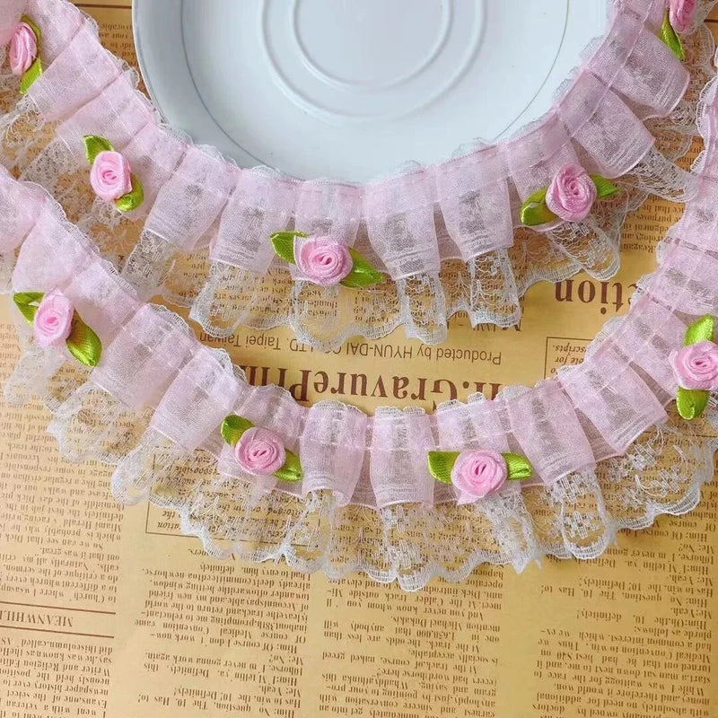 2-inch ruffled fabric trim with pink rose appliques