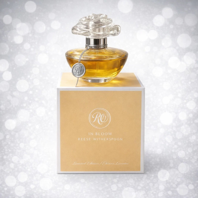 Amber eau de parfum bottle with silver cap and matching gift box