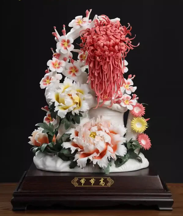 Porcelain floral tree statue with pink peony blooms, white flowers, and green leaves