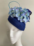 Blue air hostess fascinator with hydrangea flowers, silk abaca loops and quill! Hydrangea
