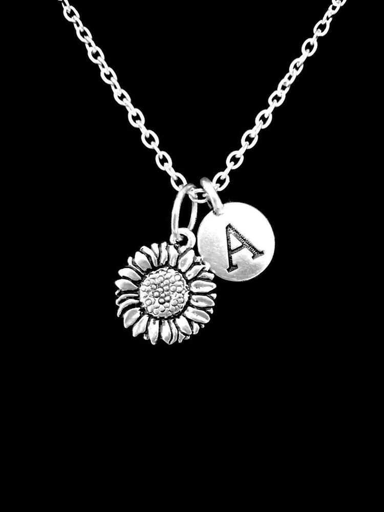 Sunflower charm necklace with circular letter A pendant, silver-tone chain
