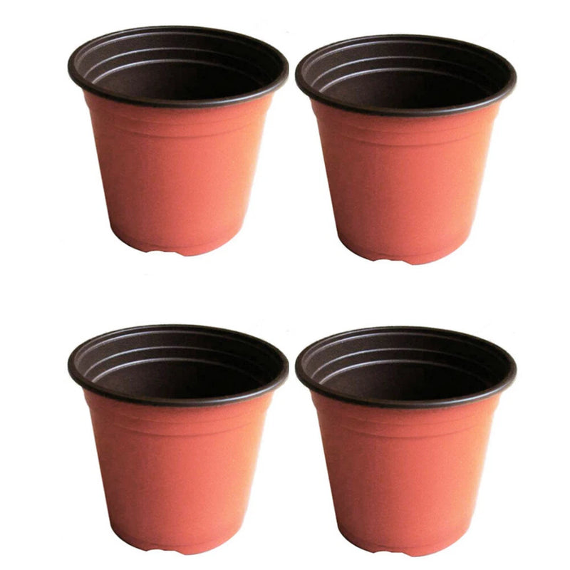 Red nursery plant pots, four round peat pots with dark rims