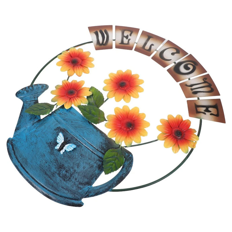 Metal flower wall wreath with blue vase and yellow sunflower accents