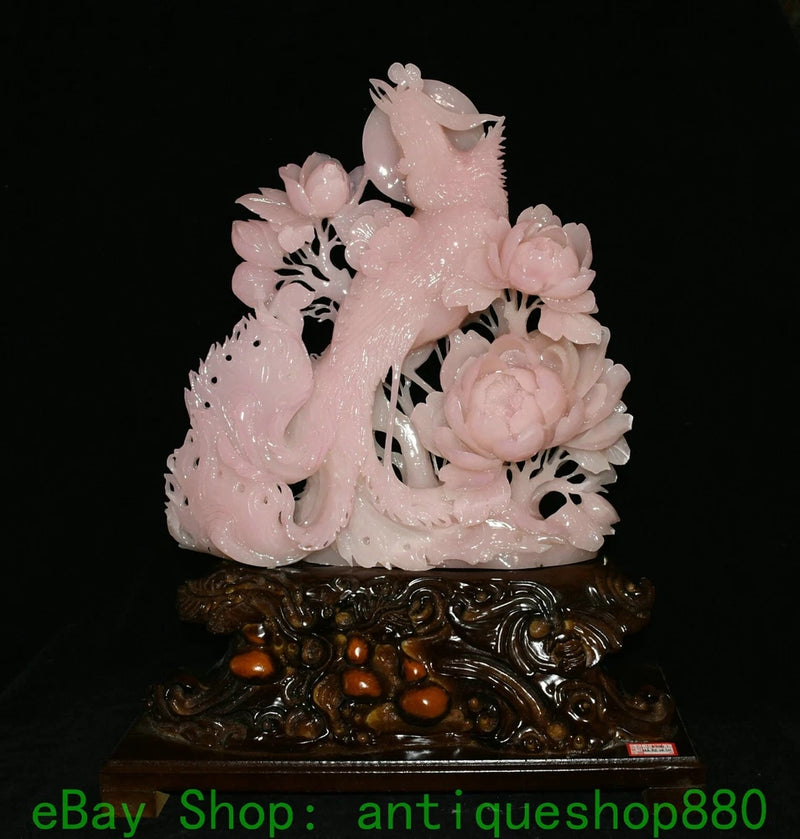 Pink carved jade phoenix and peony flower statue on ornate dark base