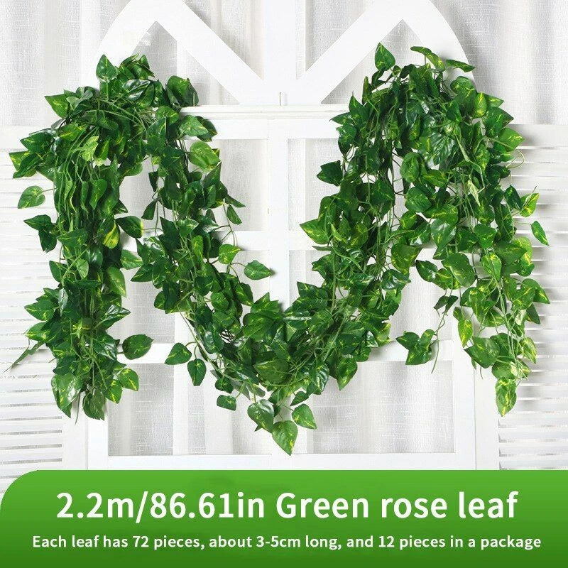 Artificial green leaf wall hanging garland with trailing leaves, 12-pack.