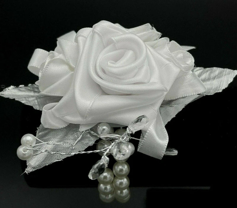 White satin rose wrist corsage with pearl bead dangle and ribbon tie