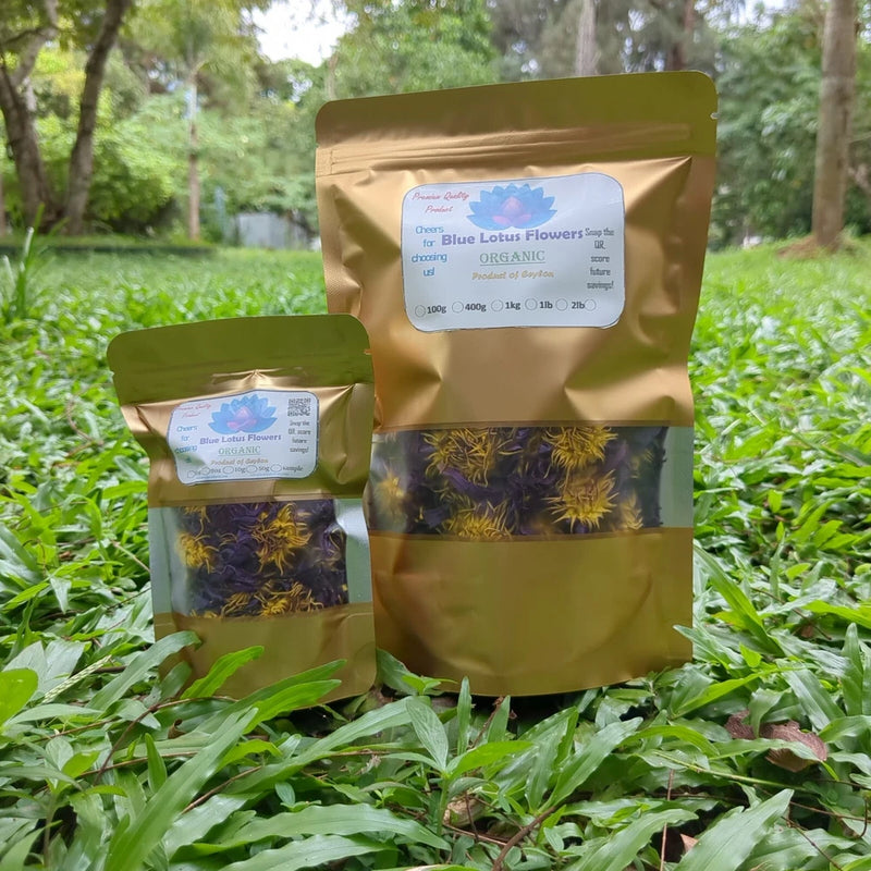 Dried blue lotus herbal tea in resealable brown pouches, with blue flower labels