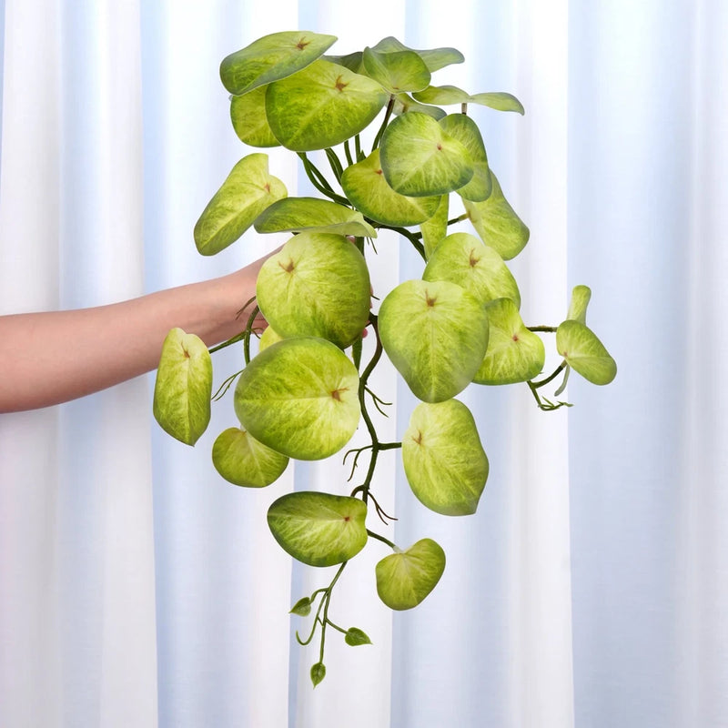 Artificial faux leaf hanging plant with bright green round leaves and stems