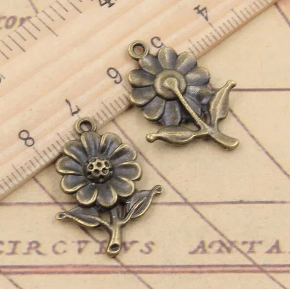Antique bronze sunflower flower pendant charm with loop, small metal flower motif