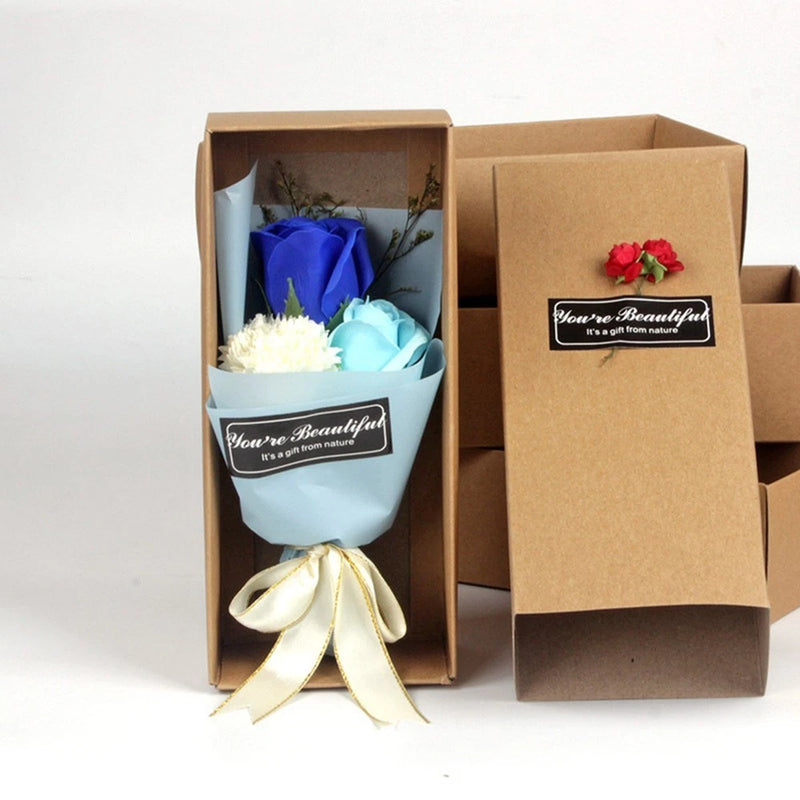 Soap flower bouquet gift in open kraft box with blue and white flowers
