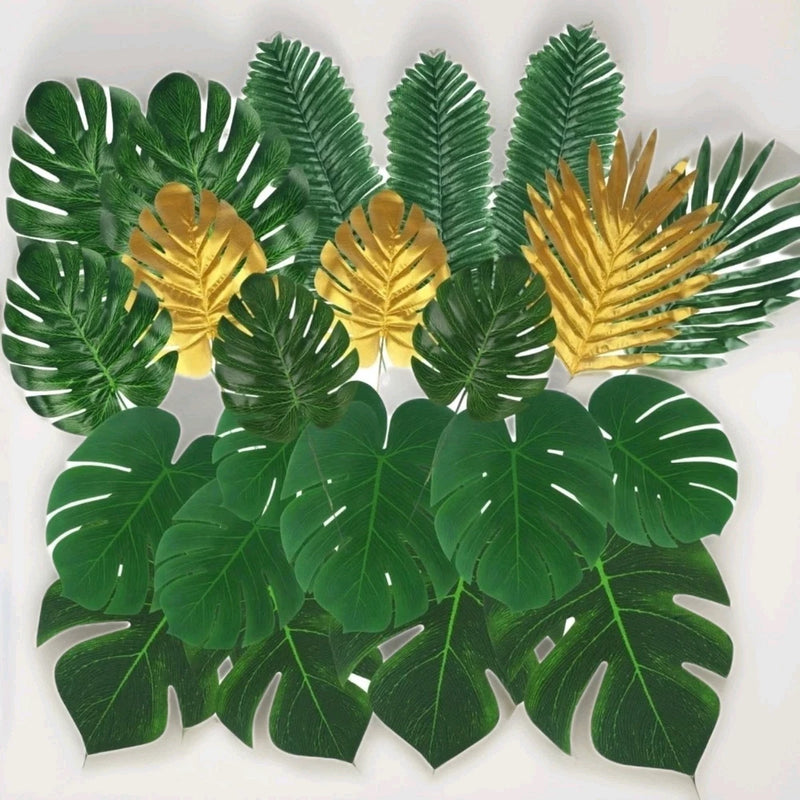 Set of artificial tropical leaves with green monstera and golden palm accents
