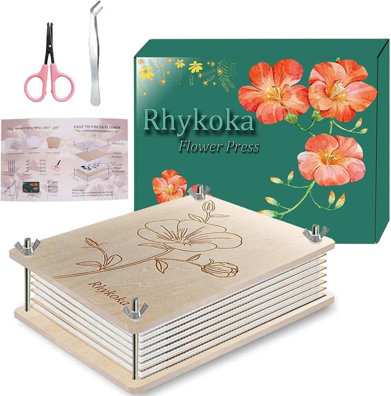 Wooden flower press with metal clamps and stacked drying plates