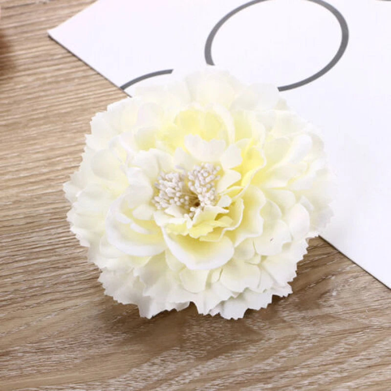Floral peony hair clip with layered cream and yellow flower on a barrette