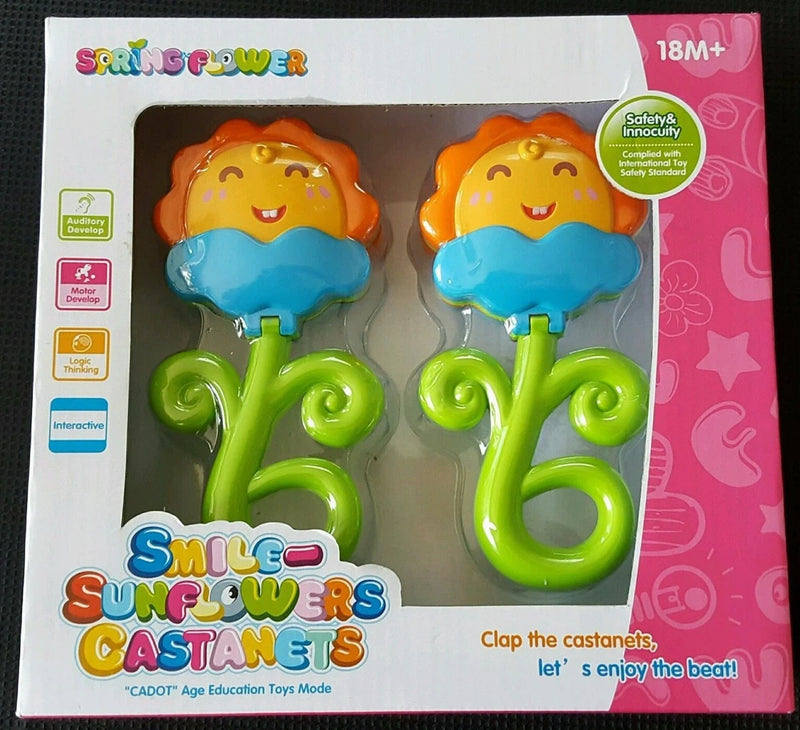 Toddler sunflower castanets set with two green clappers and smiling sun faces on box