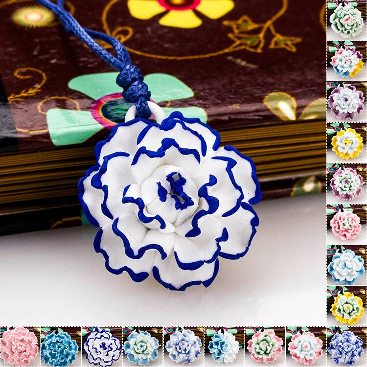 Ceramic flower necklace with blue-and-white peony pendant on braided cord
