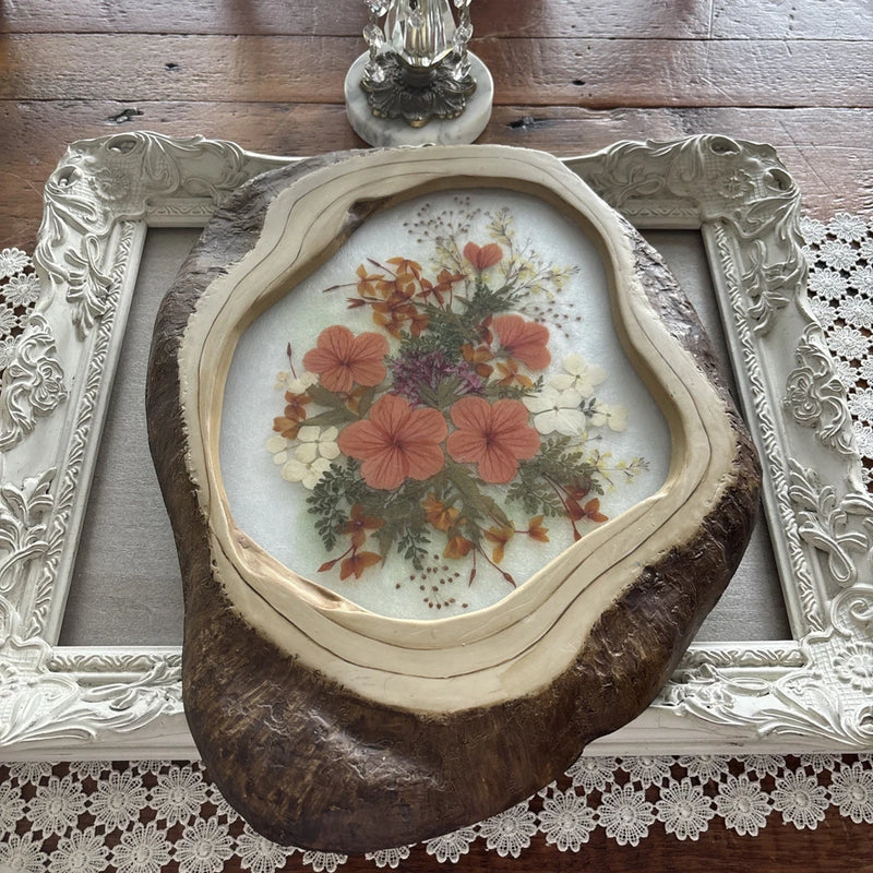 Decorative resin framed floral casing with pressed dried flowers, dark brown outer border