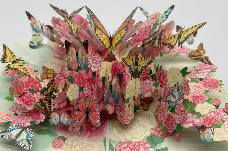 3D pop up greeting card with layered carnation flowers and colorful butterflies