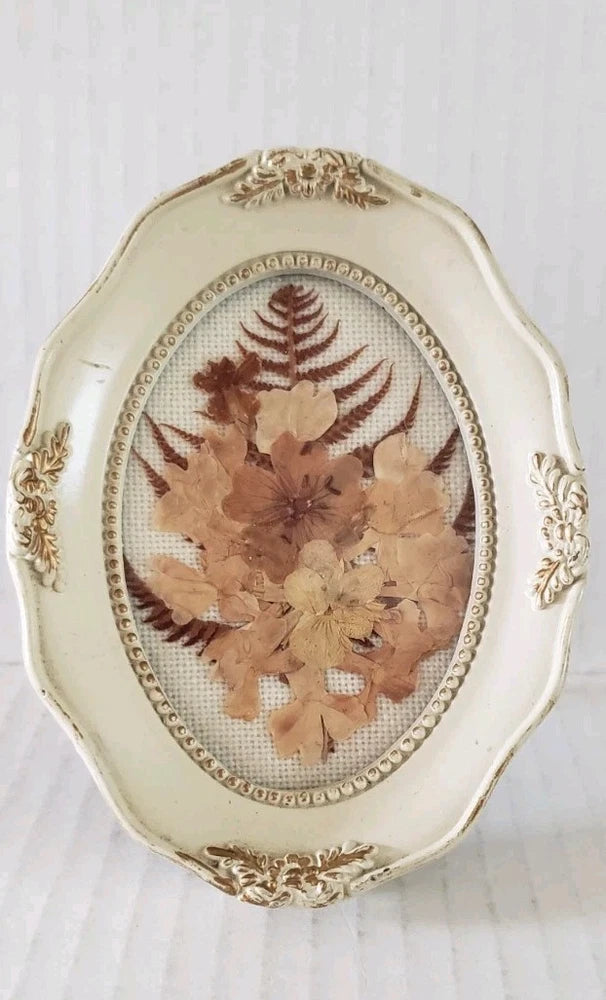 Pressed flower glass frame with velvet back, cream-gold ornate oval centerpiece