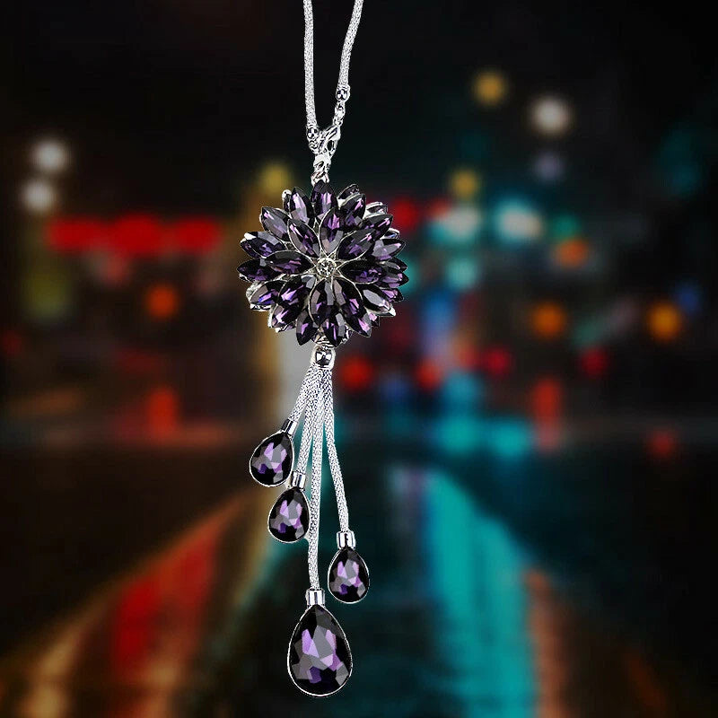 Purple rhinestone sunflower car pendant with dangling teardrop beads on silver chain
