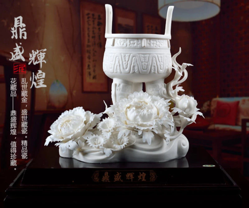 White porcelain incense burner with raised peony flowers and curved stand