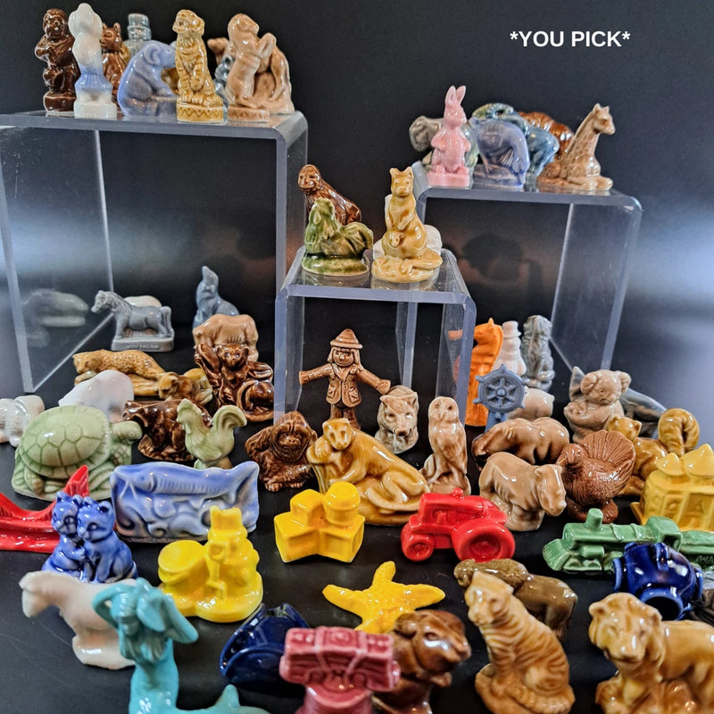 Wade Whimsies rose tea figurines, assorted small animal figures on clear display stand