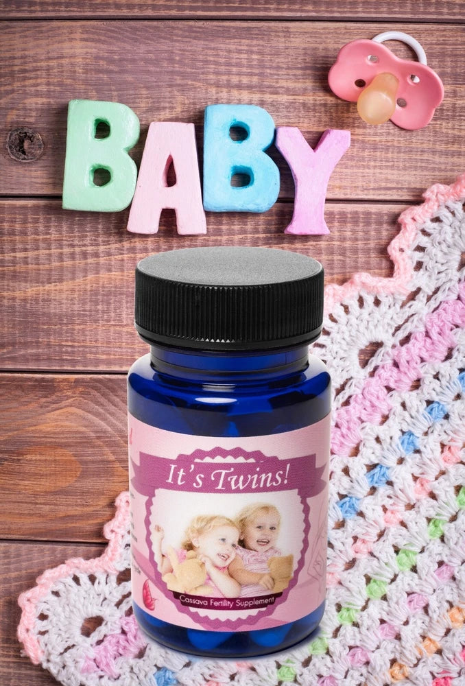 Twins fertility supplement bottle, pink label with 'It's Twins!', black cap