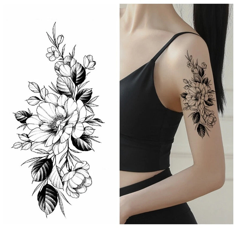 Floral sketch temporary body tattoo with peony flowers and leafy vines on an arm