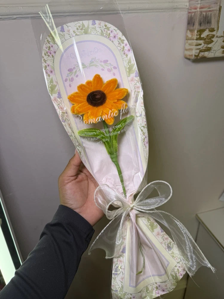 Sunflower-themed gift bag with large sunflower graphic and white ribbon bow
