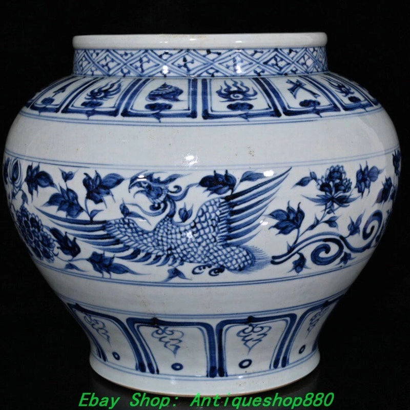 Blue-and-white porcelain jar with phoenix-and-floral relief pattern
