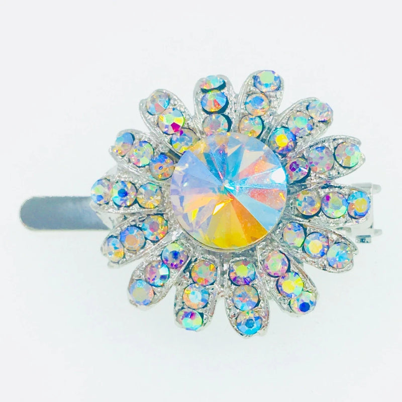 Silver rhinestone flower hair clip with iridescent crystal petals and center