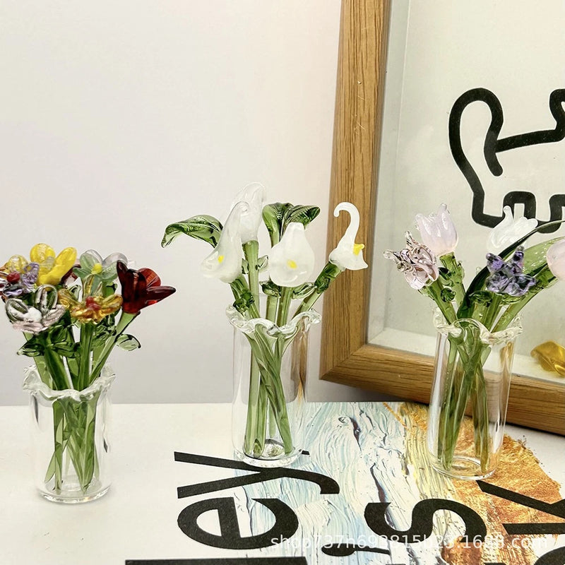 Artificial glass flower bouquet with white and pink blooms in clear vase