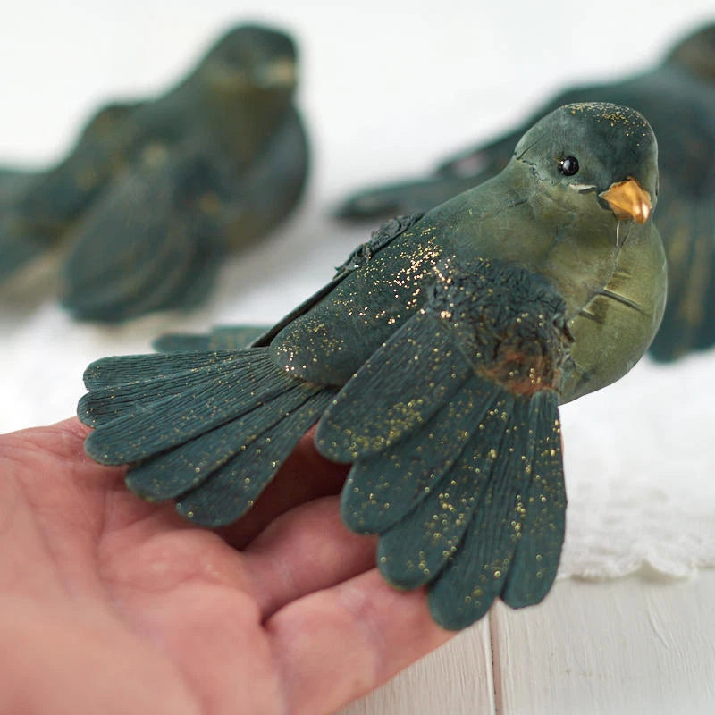 Decorative green chickadee bird figurine with gold glitter speckles and small beak