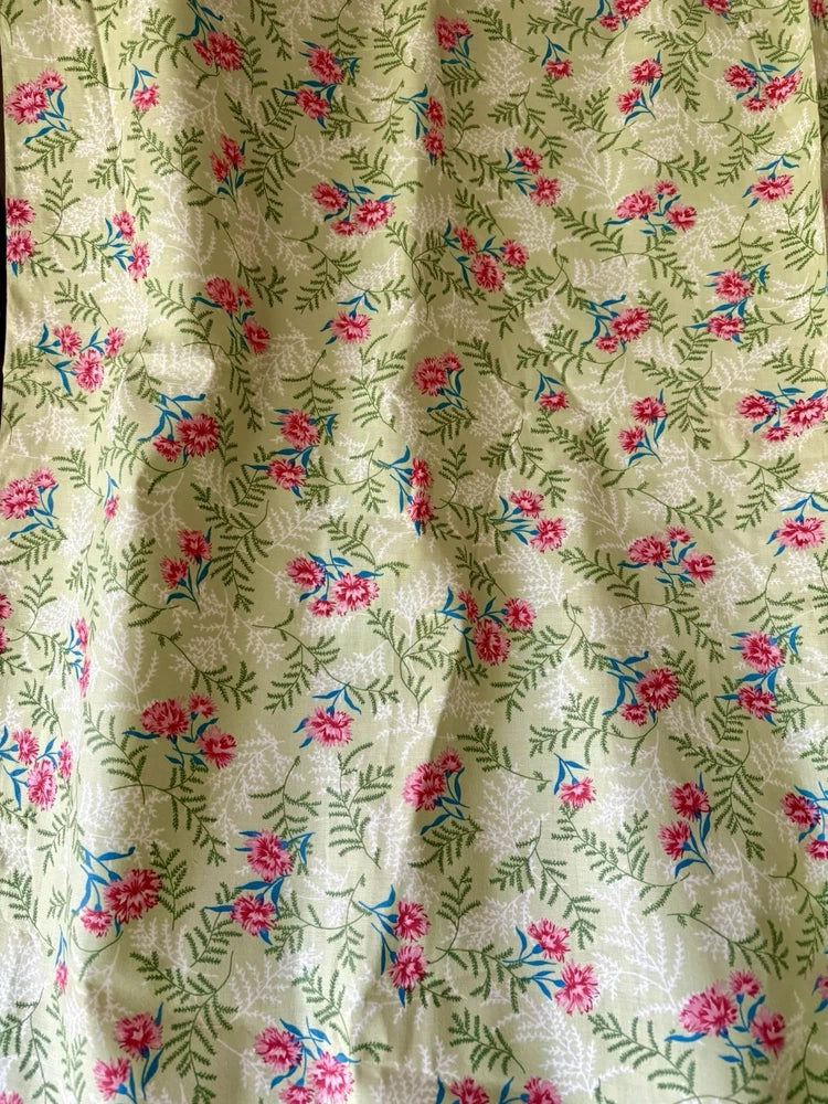 Cotton fabric with small carnation and fern floral print, pink red blue and green