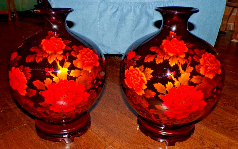 Pair of dark peony-pattern vases with colorful blossoms and pedestal bases