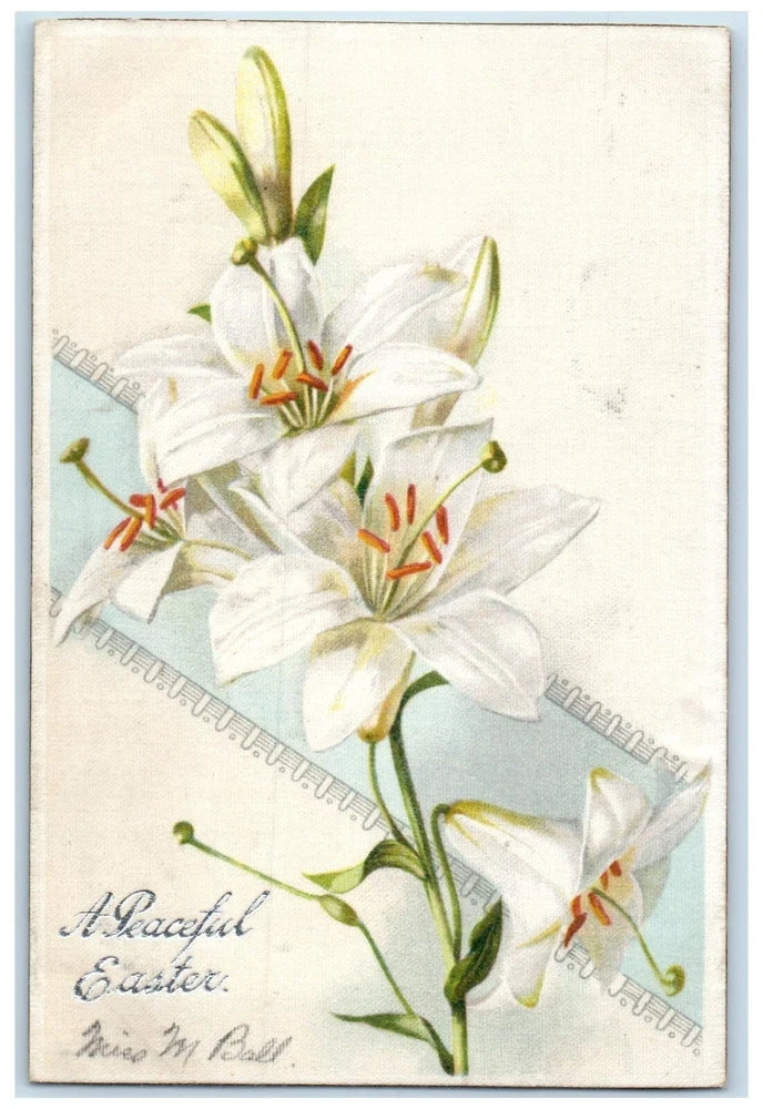 Antique postcard: white lilies with green stems and banner with greeting text