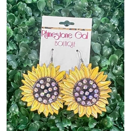 Rhinestone sunflower drop earrings with yellow petals and purple rhinestone centers
