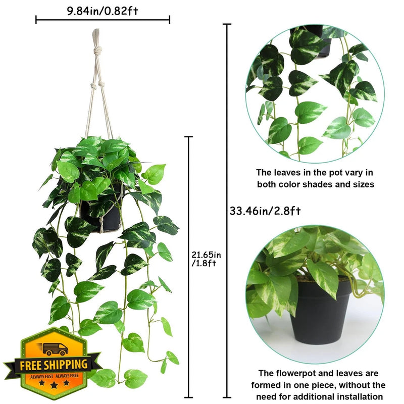 Artificial hanging pothos vine plant with green leaves in a black pot