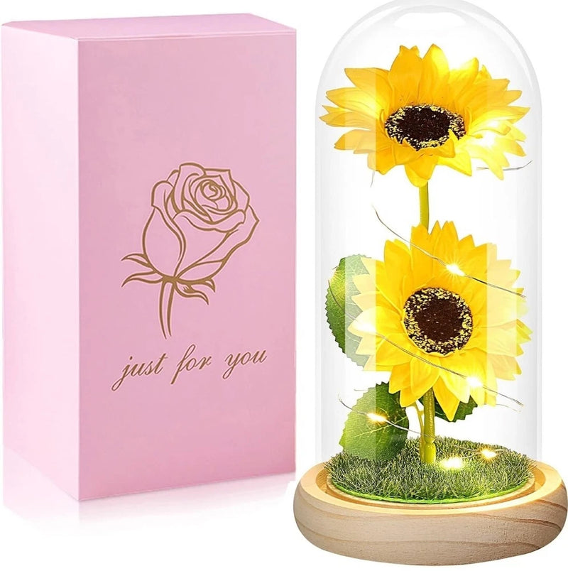 Glass dome sunflower flower arrangement with two yellow blooms on moss base