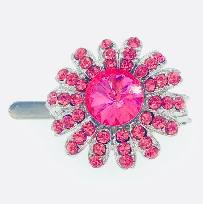 Pink rhinestone sunflower hair clip with crystal center on silver barrette