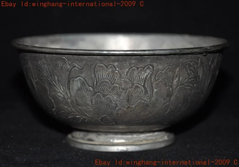 Tibetan silver peony relief bowl with embossed floral pattern