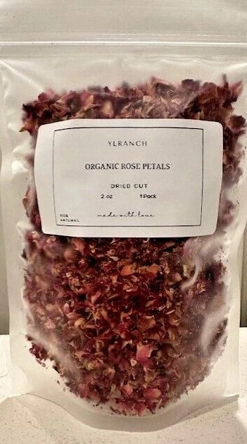 Dried organic rose petals in white pouch; maroon petals; product label on front