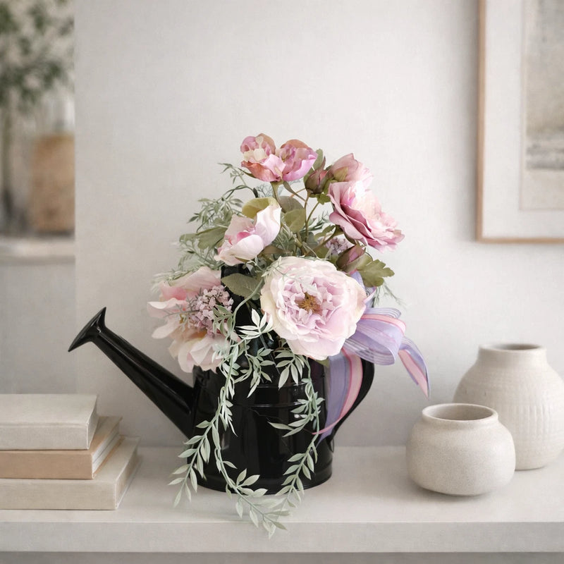 Pink floral arrangement in black metal pitcher, hydrangea arrangement Ranunculus
