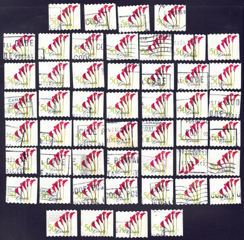 Used red calla lily postage stamps, set of small stamp designs on dark backing