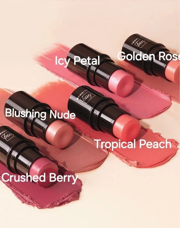 Cheek color glimmer balm sticks in pink shades, several tubes with attached caps.