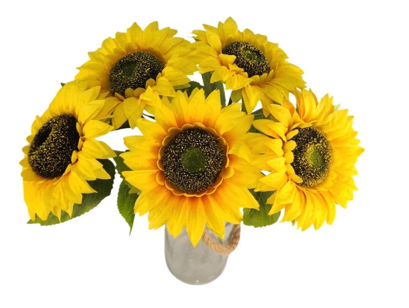 Artificial sunflower bouquet with five yellow blooms and dark centers, short stems in small vase