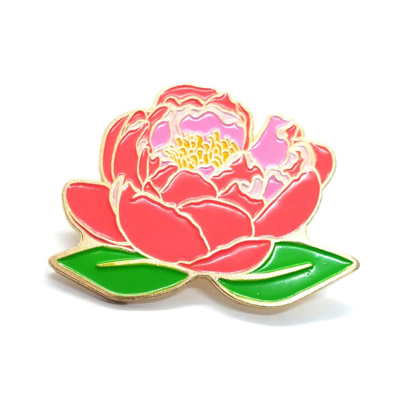 Pink peony enamel flower pin with red-pink petals and green leaves