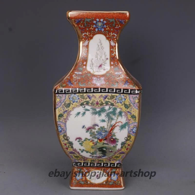 Colorful porcelain vase with peony and bird motif, gold rim and dark blue band